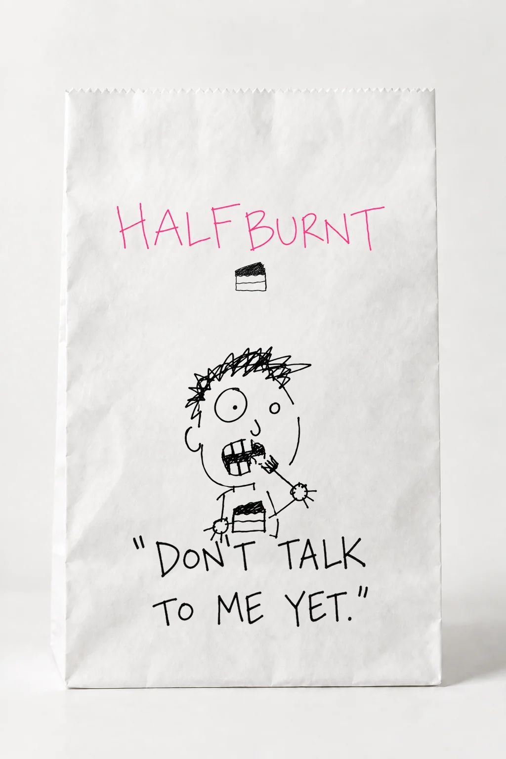 흰 종이봉투 앞면 — 위에 핑크 로고, 가운데 입 벌린 초콜릿 손님, 아래에 DON'T TALK TO ME YET 인용문